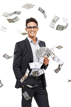 Smiling man holding a fan of cash as more cash falls from the sky around him