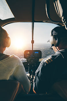 Pilot and co-pilot flying a helicoper