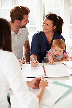 Couple meeting with their insurance advisor to talk about annuities and financial planning